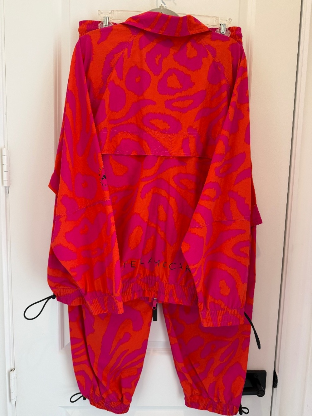 Stella McCartney vibrant Adidas. This set includes a Jacket and Pants. Like new.